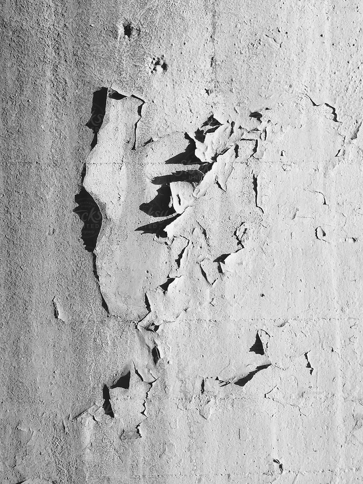 Close up of peeling paint and textures on concrete wall