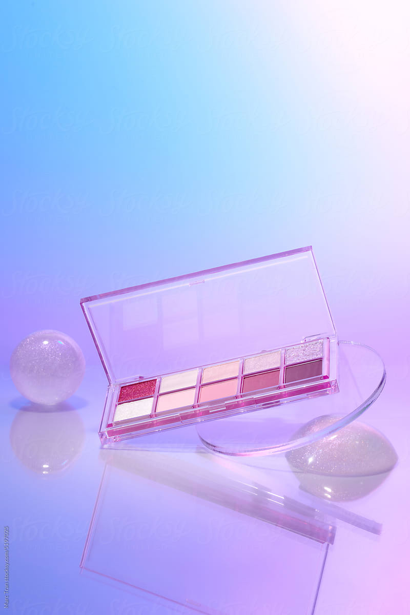 Eyeshadow palette suspended crystal ball on colorful light