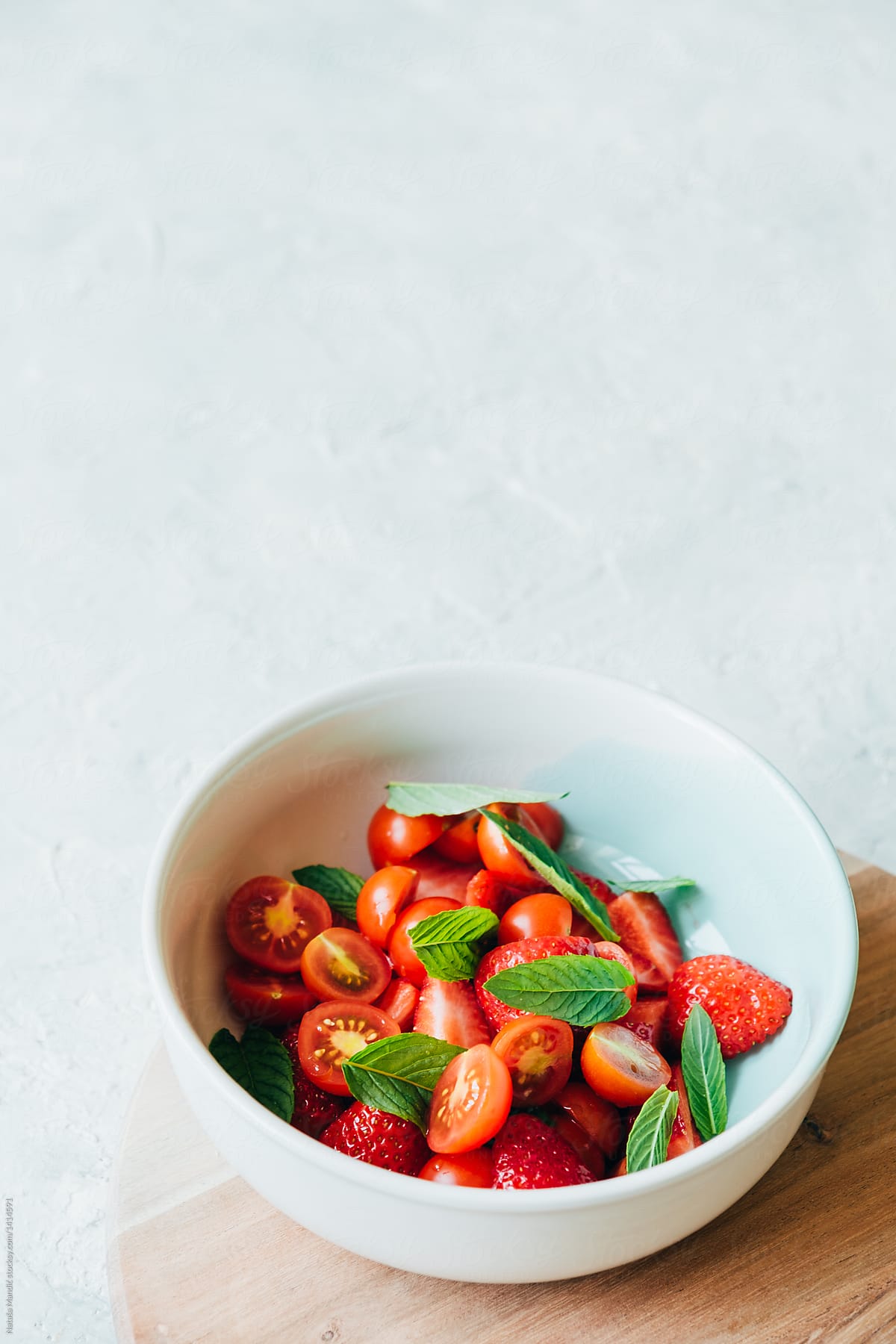 Strawberry and cherry tomato salad with mint
